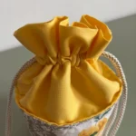 Pochon rond en tissu - Miniature 2